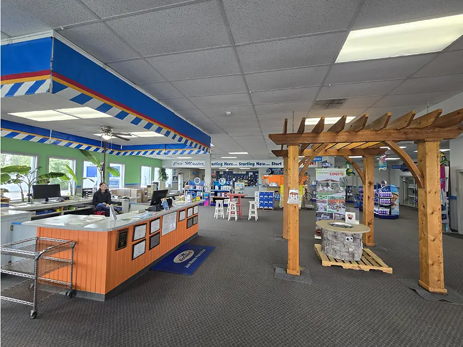 Jan Master Pool & Spa store location interior, front desk with employees - Decatur, IL