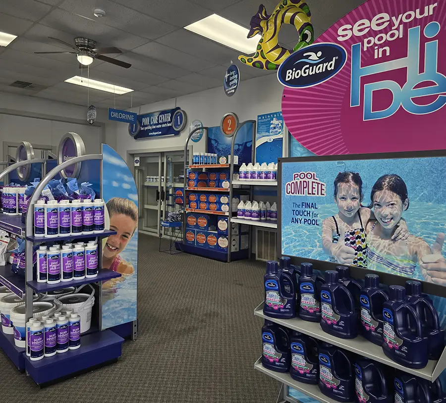 BioGuard ad, blonde woman enjoying pool with golden retriever dog, swimming - Decatur, IL